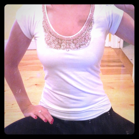 White shirt with bead embellishments