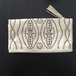 Double fold clutch with metallic studs