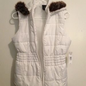 White vest with fur on hood