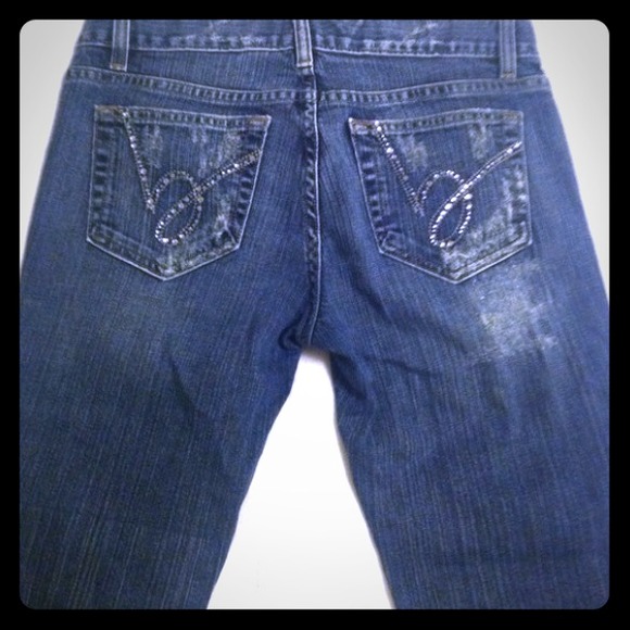 Bebe blue jeans with nice back pocket design.