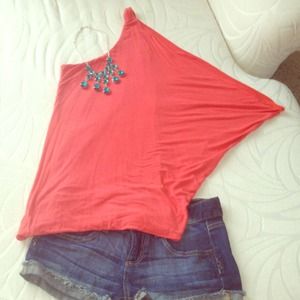 Bundled coral top and navy dress