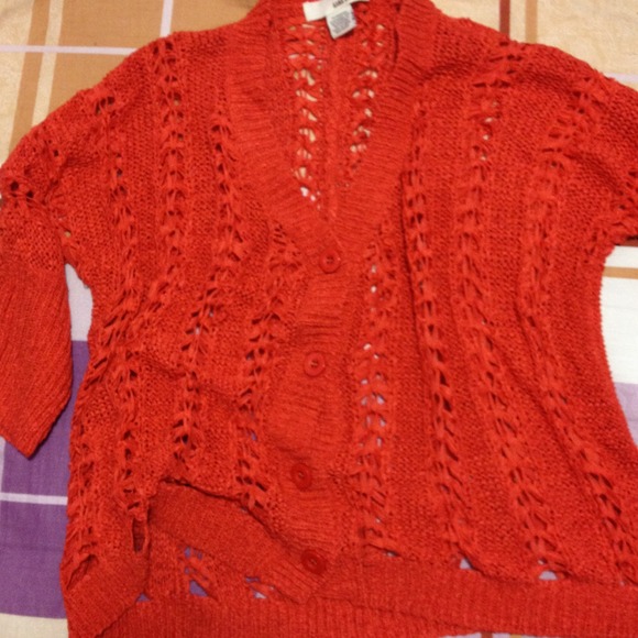 Bright orange sweater