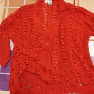 Bright orange sweater