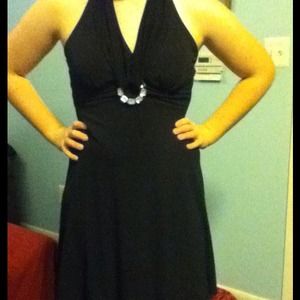 Black, knee length party dress.