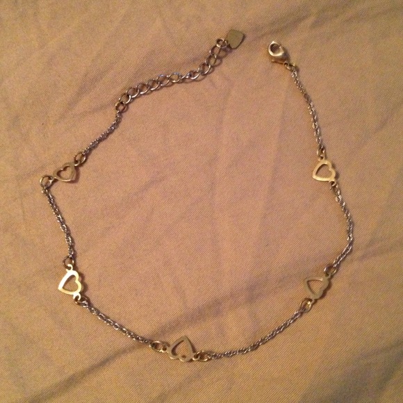 Gold and silver tone ankle bracelet.