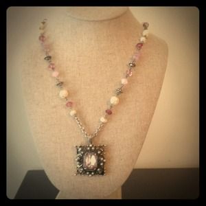 Antique style stone pendant