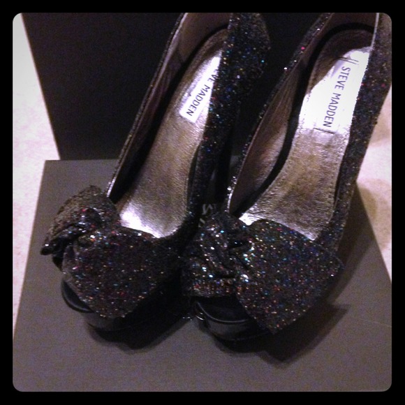 Awesome very high and sparkly peep toe. Worn once.