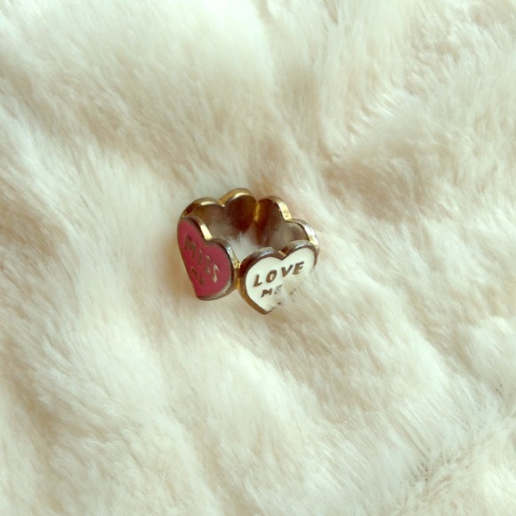 Ring with heart shape sides
