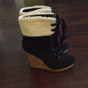 NWOT. Fabulous wedge booties with fur! Never worn!