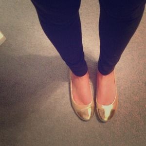 Gold cap toe flat with studs on back