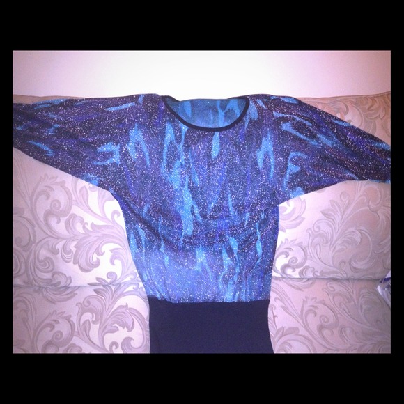 Express metallic shoulder tunic sweater.