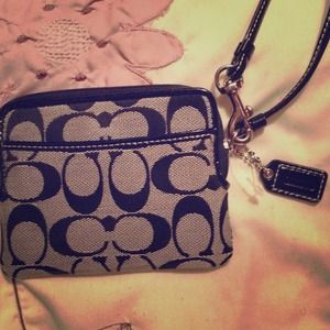 Coach mini clutch. Authentic. Never been used.