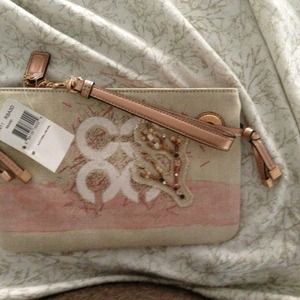 Large coral coach wristlet. New with tag.
