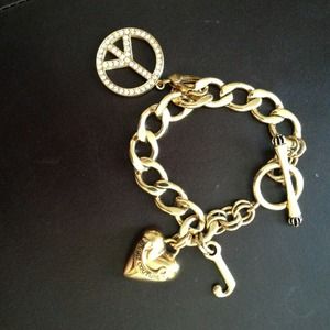 Juicy Couture 14k gold plate charm bracelet