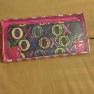 XOXO cluch/wristlet. BRAND NEW WITH FULL TAGS