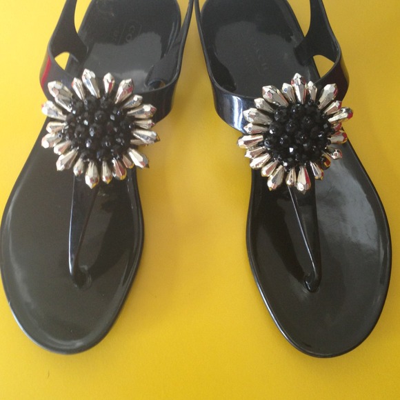 Black with silver flower sandals from Coach