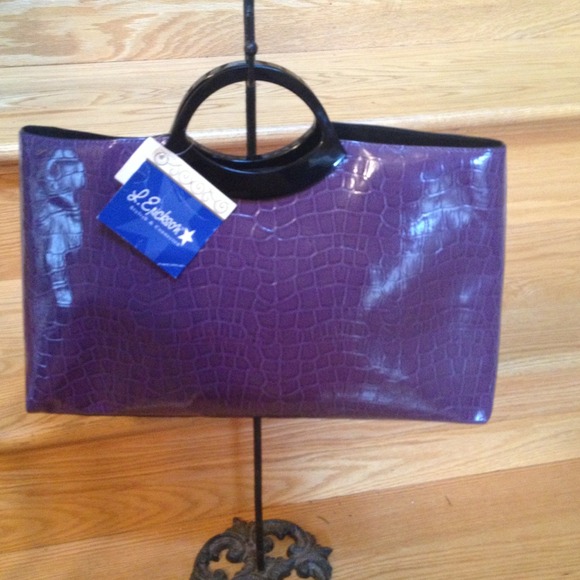 L. Erickson "Mid-Level Executive" crock handbag.