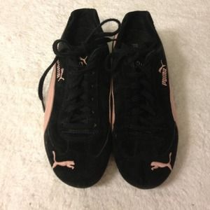 Pink and black Puma sneakers