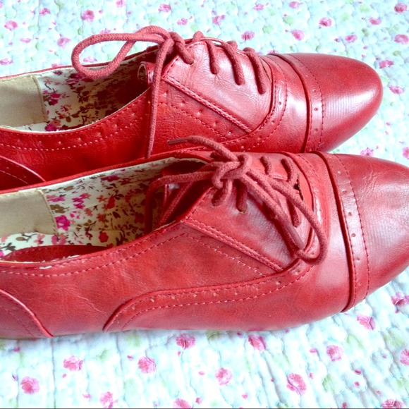 Red Oxford shoes.