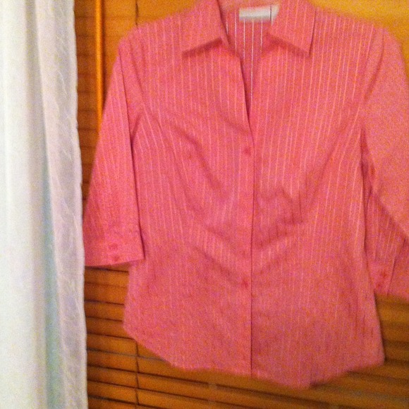 Pink shirt.