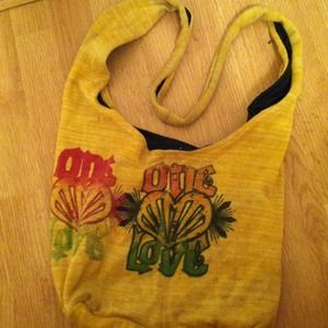 one love rasta colored bag w/ long shoulder strap