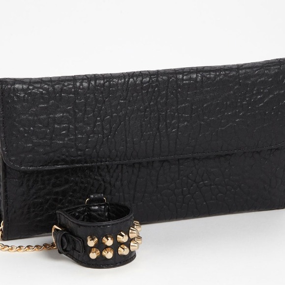 Cuff link studded clutch brand new never worn
