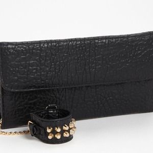 Cuff link studded clutch brand new never worn