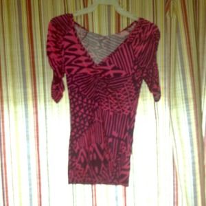 Pink and Navy short sleeve shirt.