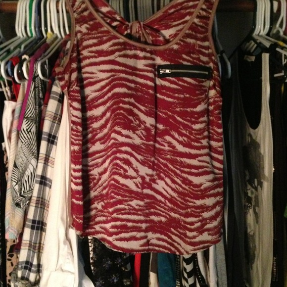 Purple zebra tank with zipper accent pocket.