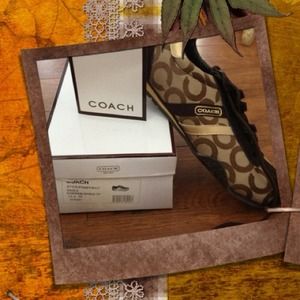 Coach sneakers never worn in brown