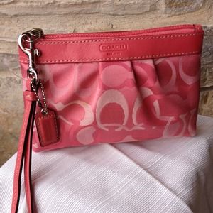 Pink wrist Authentic Coach purse