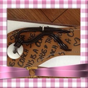 Coach coffee flip flops