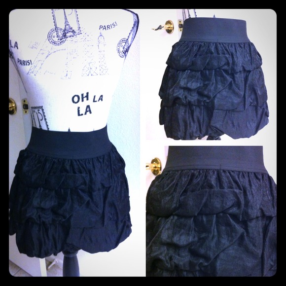 Black skirt with ruffles all over