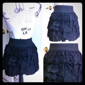 Black skirt with ruffles all over