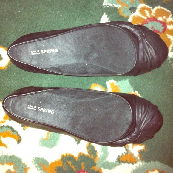 A pair of black flats