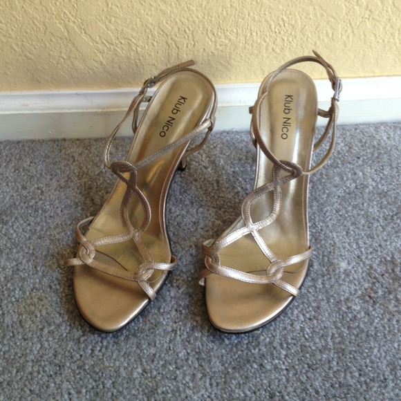 Gold strapped cocktail heels.