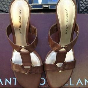 Brand new, never worn. Size 6.5.