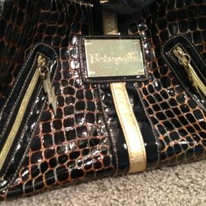Authentic Betsyville black and gold purse $25
