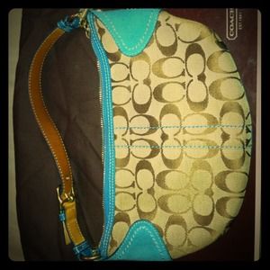 Authentic Coach bag with blue suede accents