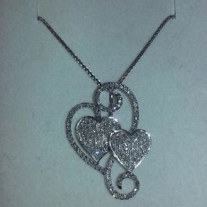 Diamond heart pendant with 16 in chain in 14k