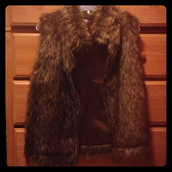 SOLD Beautiful fur vest brand new!!!