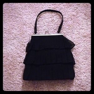 Small hand-held purse