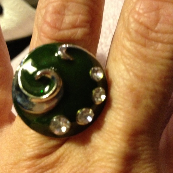 Emerald green w/crystals swirl ring.