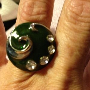 Emerald green w/crystals swirl ring.