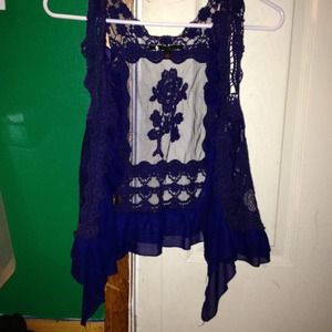 Vested over top. Navy blue.