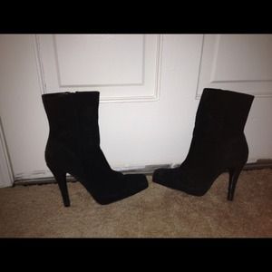 Steve Madden black platform suede boots.