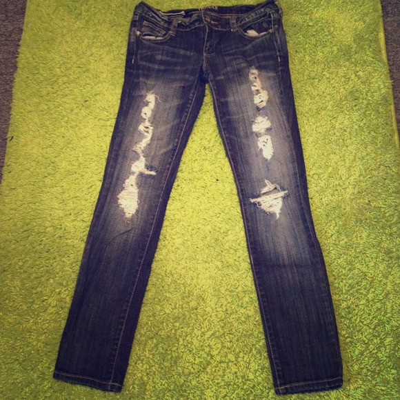 Distressed denim jeans
