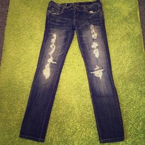 Distressed denim jeans