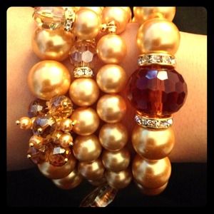 Unique handmade stackable bracelets with charms.