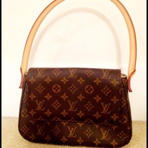 Authentic. LV -bought used last year for $450.